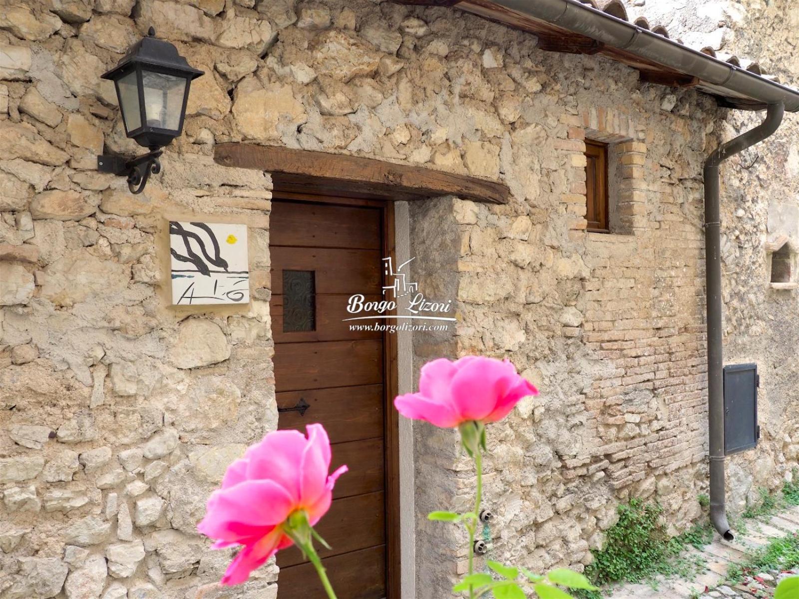 Relais Borgo Lizori Country House 克利通诺河畔坎佩洛 外观 照片